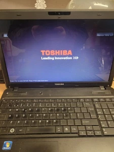 Toshiba Satellite C660D-144 Laptop. Powers Up, Battery & Loading Problem, Spares - Picture 1 of 24
