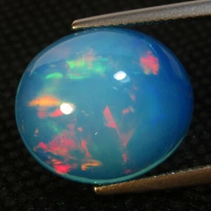 10.60Cts Natural Color Play Ethiopian Blue Opal Oval Cabochon Loose Gem VOD - Picture 1 of 5
