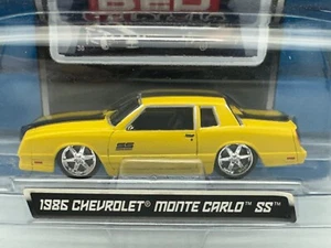 Chevrolet Monte Carlo SS 1986 Maisto All Stars rojo, amarillo, 1:64, nuevo en caja - Imagen 1 de 11