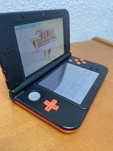 Nintendo 3DS XL 4GB Handheld-System - Orange/Schwarz (2208532) - Bild 1 von 20