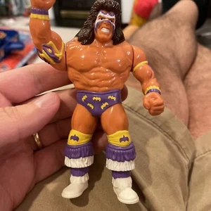 WWE WWF Smackdown Hasbro violeta Ultimate Warrior Serie 3 Titan Sport 1991 RARO - Imagen 1 de 6