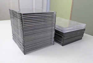CD + DVD Leerhüllen, 27 Stk CD Slimcase 5mm- schwarz/transparent + 6 DVD Hüllen - Bild 1 von 3