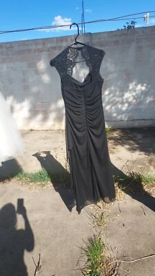 Stunning black lace bridesmaid dress size 6.  Has a very sexy fit. Lace sleeves  - Image 1 of 2