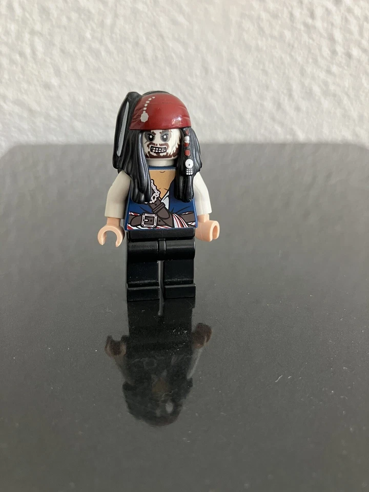 lego pirates des caraibes figurine capitaine jack sparrow blanc - Photo 1/1