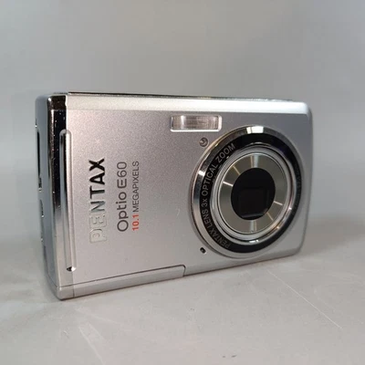 Pentax Digital Camera Optio E60 10.1MP Silver Tested Pentax Digital Camera - Image 1 of 4