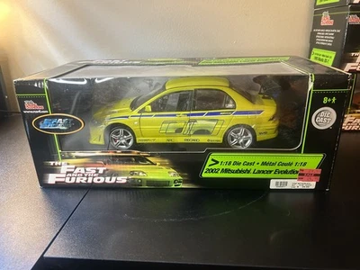 Racing Champions 2 Fast 2 Furious 2002 Mitsubishi Lancer EVO VII 1:18 Die Cast Foto 1 de 4