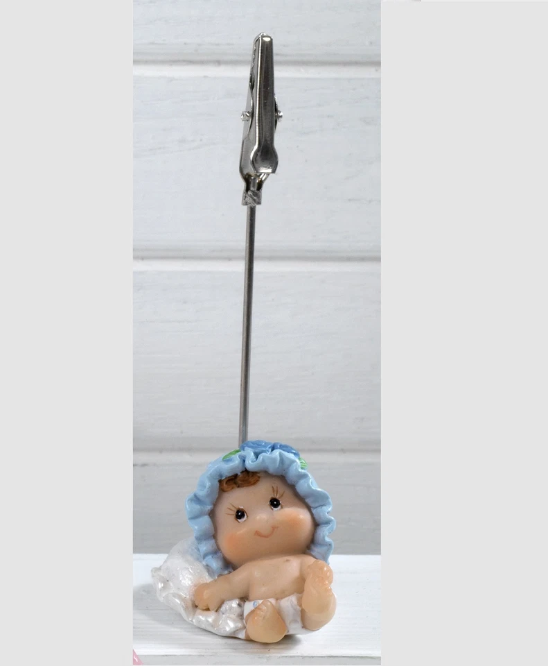 Bomboniera battesimo Clip Bimbo su cuscino,12 pz. ,in resina, Mandorle by Paben  - Image 1 of 1