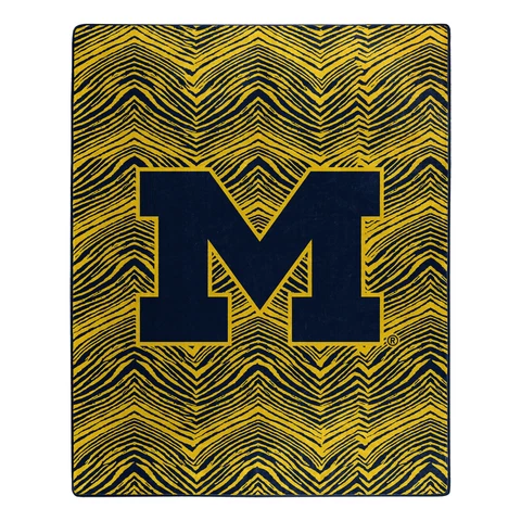 Zubaz by Northwest NCAA Zubified Raschel Throw Blanket, Michigan Wolverines Cover