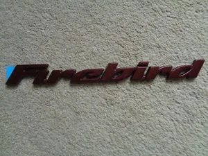 GM PONTIAC FIREBIRD DOOR EMBLEM 1998 99 2000 2001 2002 RED ORIGINAL GENUINE NOS - Picture 1 of 3