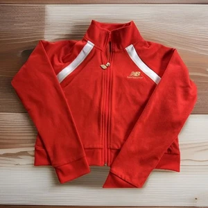 Chaqueta de bombardero New Balance Little Kids roja dorada con cremallera pequeña - Imagen 1 de 3