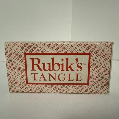 Rompecabezas Rubik’s Tangle 1 vintage años 90 tamaño caja de cerillas grande en caja   Foto 1 de 3