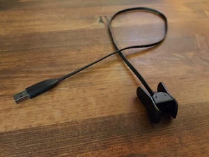 Oryginalny kabel ładujący Garmin 010-12637-00 do śledzenia aktywności Vivosmart 3 - w bardzo dobrym stanie - Zdjęcie 1 z 4