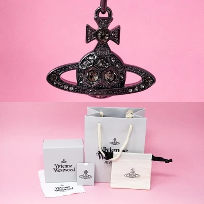 Vivienne Westwood Collar Pistola Metal Hexágono Cristal Orbe Colgante y Caja de Regalo Foto 1 de 4