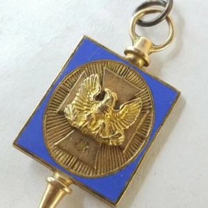 Eagle Crest Keychain 1-1/8 Inch Tall Gold Tone/Blue - Picture 1 of 5