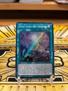 Yugioh Edle Ader des Urerzes Secret Rare BLMM-DE172 - Bild 1 von 1