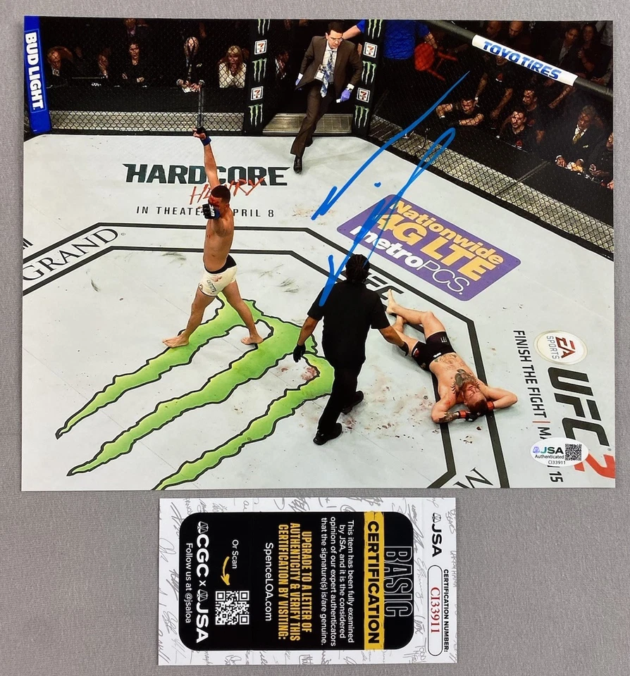 NATE DIAZ AUTOGRAPH 8x10 FIGHT VICTORY PHOTO UFC/MMA vs McGREGOR JSA CI33911 - Image 1 of 1