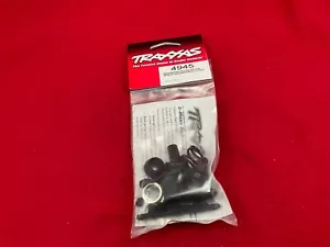 Traxxas 4945 Campane sterzo / servo risparmiatore / molla / fermo T-MAXX 3.3 - Foto 1 di 3