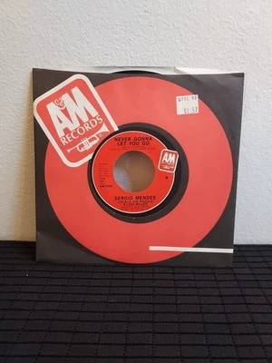 SERGIO MENDES~Never Gonna Let You Go / Guiding Star 7" LP~ 1976 Capitol Records  - Image 1 of 4