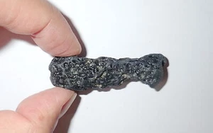 Piedra de tectita de indoquinita negra de China 13,3 gramos 55x18x14 mm - Imagen 1 de 8