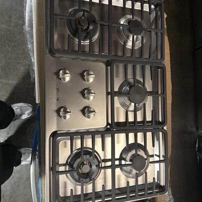 KM3475G-MIELE 36" 5 QUEMADORES PLACA INOXIDABLE MODELO PANTALLA Foto 1 de 4