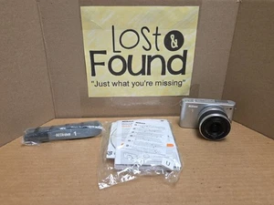 Nikon 1 J1 10.1MP Digital Camera W/  10-30mm Lens Full HD 1080p Silver UNTESTED - Foto 1 di 10