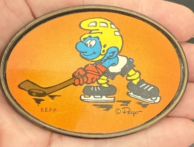 Oden Pitufo Cinturón Hebilla Hockey Naranja Ovalado Latón De Colección Foto 1 de 4