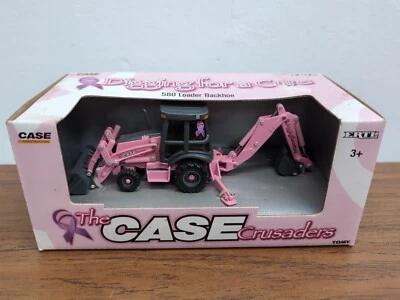 Retroexcavadora rosa estuche 580 de juguete Ertl 1/50 “Digging For A Cure” Foto 1 de 3