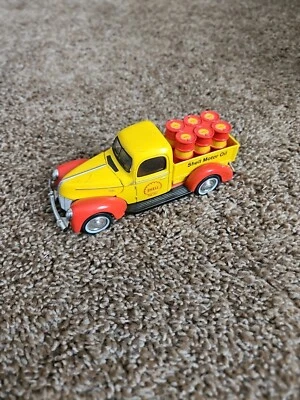 NEW RAY TOYS 1:32 SCALE DIECAST  SHELL PICKUP WITH OIL DRUMS - Image 1 of 4