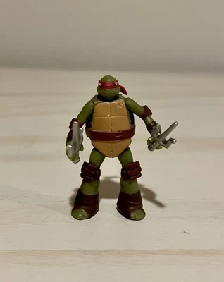 Mini figura de acción Takara Tomy Arts Teenage Mutant Ninja Turtles Raphael 2" TMNT Foto 1 de 4