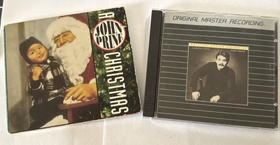 JOHN PRINE  2 CDs: A John Prine Christmas (1993)  &  Aimless Love (RARE MFSL) Foto 1 de 4