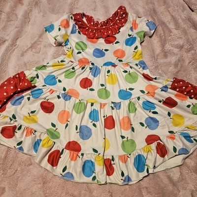 Vestido Marie Nicole Niñas XL Estampado Manzana Volantes en Niveles Lunares Bolsillos Foto 1 de 4