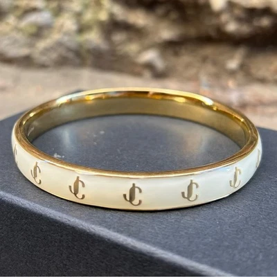 NUEVO Brazalete Grande Jimmy Choo Acabado Dorado Metal y Esmalte Flor JC Foto 1 de 4