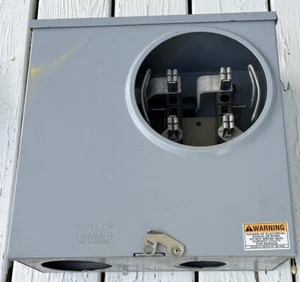Used Cutler Hammer 200 AMP Meter Base. 3” and 2” knockouts in bottom. - Picture 1 of 9