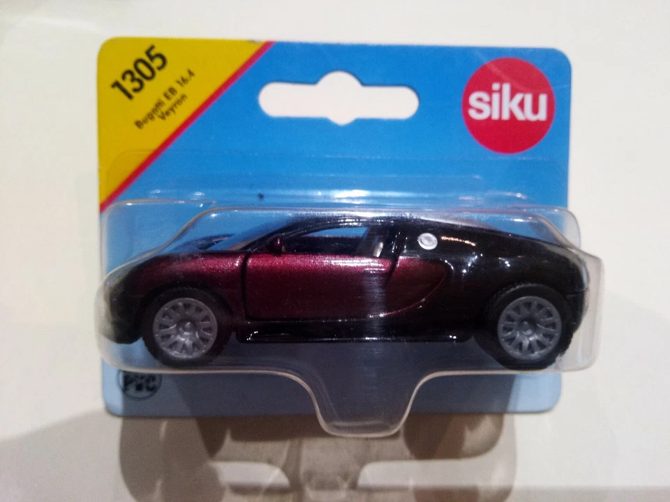 Siku Bugatti EB 16.4 Veyron Art. Nr. 1305 bordeaux/nero Die Cast Metal 1/55 - Immagine 1 di 1