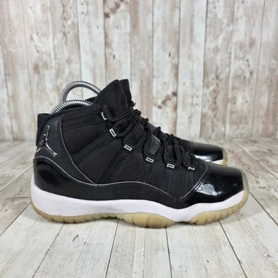 Zapatillas de baloncesto Air Jordan 11 retro de charol negro para niños - Imagen 1 de 4