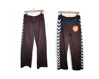 Pantalones deportivos Hummel con cremallera en la pierna en marrón talla S Foto 1 de 4
