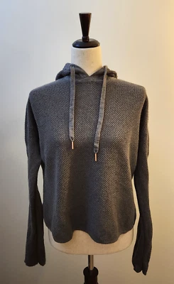 Sudadera con Capucha Recortada Betty Sudadera Tejida Malla Gris Atletismo Yoga Salón Elegante Foto 1 de 4