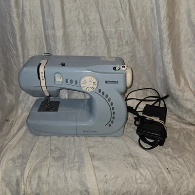 Kenmore Mini Ultra Light Sewing Machine  Baby Blue W/ Pedal Model 385 1120 6300’ - Image 1 of 4