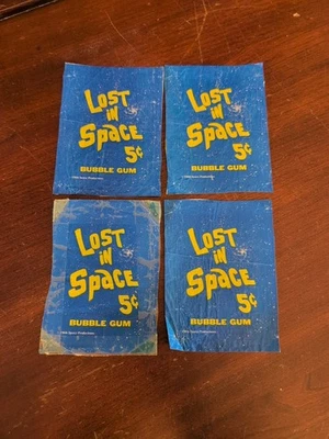 1966 Topps Lost In Space 5¢ Cents Wax  Wrappers Set Of 4 Cut Wrappers - Image 1 of 4