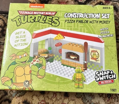 Bloque de construcción Nickelodeon TMNT pizza salón con broche de presión y interruptor Mikey 80 piezas Foto 1 de 4