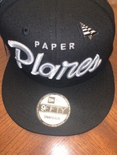 paper plane hat meaning