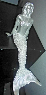 Mermaid Statue Figurine~ hangs off shelf~ 7 1/2 in. tall x 15 in.~ Plastic resin - Image 1 of 4