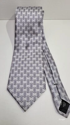 Corbata marca Arrow, seda estampada plata y gris Foto 1 de 4
