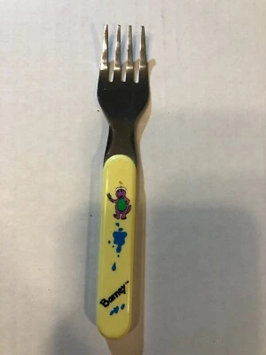 Tenedor vintage 1992 Barney The Lyons Group Selandia para niños pequeños solo cubiertos amarillos Foto 1 de 4