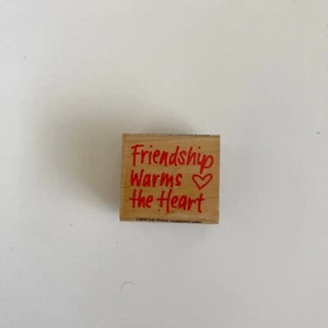 Sello de goma de madera Hero Arts Friendship Warms the Heart E474 - Imagen 1 de 3