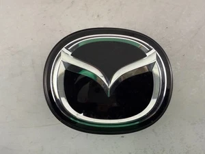 OEM | 2018 - 2022 Mazda CX-3 / CX-5 / CX-9 Front Radar Emblem #DGJ1-50721 - Picture 1 of 9