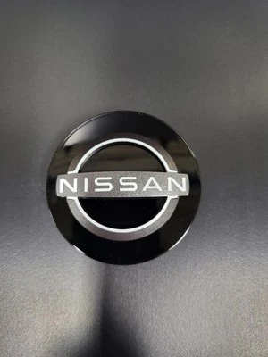 NEW OEM NISSAN CENTER CAP 40342-9LT0A ALTIMA VERSA MAXIMA - Image 1 of 4