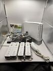 Wii Console With Four Wii Controllers, Wii Sports, And Wii Manual