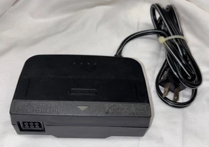 ADAPTADOR DE CORRIENTE FUENTE OFICIAL NINTENDO 64 AC OEM N64 Original 100V NUS-002 - Imagen 1 de 4