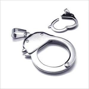 PENDENTIF DE LUXE FEMME HOMME ACIER NEUF ORIGINAL CADEAU FORME MENOTTE PL460 - Imagen 1 de 1